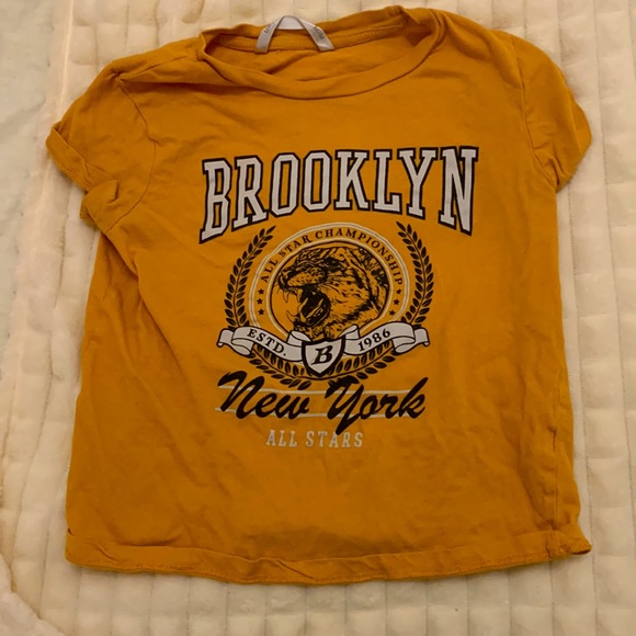 Orange shirt for a kid - Picture 2 of 3